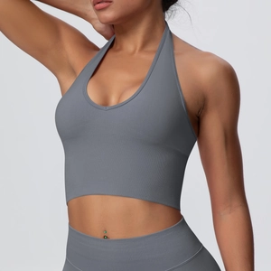 Close-up of grey high-elastic ribbed knit fabric on a halter neck sports bra set