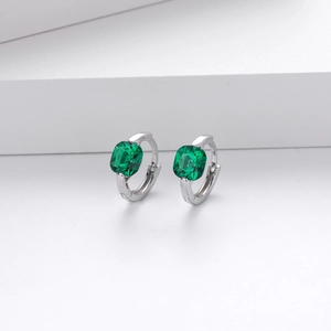 Detail view of S925 sterling silver hoop earrings with square emerald green zircon stones