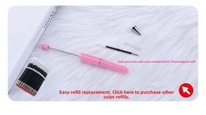 Detailed view of pink beaded pen components and a 1.0mm black ink refill pack