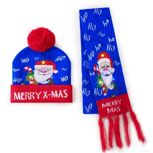 Detail of blue knitted Christmas hat and scarf set with LED lights and HO HO HO pattern