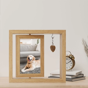 Minimalist double-sided rotating wooden heart photo frame with a memorial pendant and natural grain