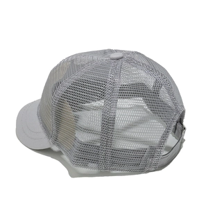 Detail view of the breathable grey mesh fabric and stitching on the outdoor baseball cap