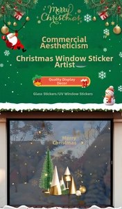 Detail of UV-printed gold Christmas tree and snowflake window stickers on glass surfaces