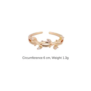 Eleganter goldener verstellbarer Zweigring mit Rankendesign und Zirkonia für Damen