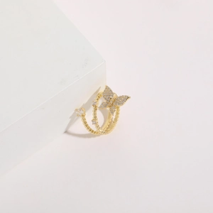 Macro shot of 14K gold plated butterfly ring with micro-pave cubic zirconia details