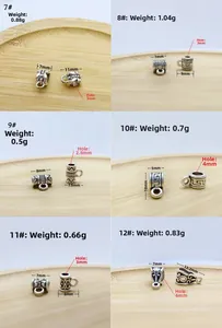 Detail view of vintage tibetan silver connectors with antique patterns for jewelry making