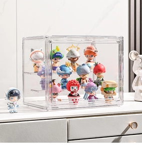 Clear acrylic display case for blind box figures with two-tier internal steps and door