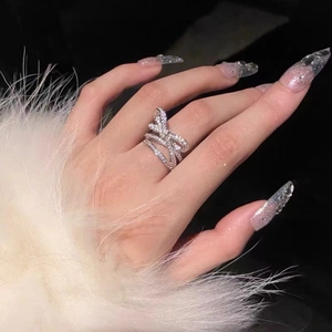 Elegant silver open ring featuring a sparkling 3D diamond-set bowknot design