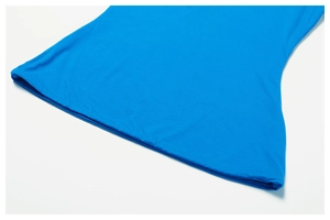Detail of royal blue yoga shirt hem showing clean stitching and elastic knitted fabric