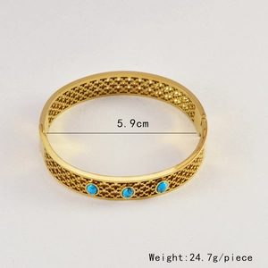 Gold bohemian cuff bracelet detail showing 5.9cm inner diameter and 24.7g weight