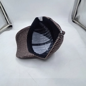 Classic brown houndstooth baseball cap with durable hard top and polyester inner lining