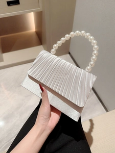 Elegant white satin evening clutch bag with pleated fabric and pearl beaded handle strap