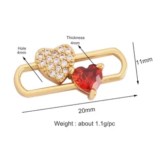 Macro detail of gold plated heart connector with cubic zirconia for DIY jewelry making