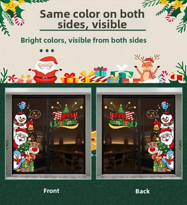 Detailed view of double-sided Christmas window stickers with Santa and reindeer motifs
