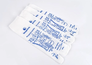 Detail of white cotton acupoint socks featuring blue anatomical maps and English labels