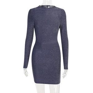 Detail of glittery navy blue long-sleeved bodycon dress with shimmering silver lurex fabric