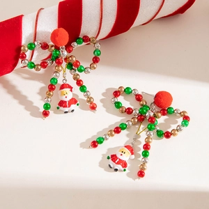 Christmas bow earrings with Santa Claus pendants, colorful beads and red fur balls