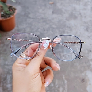 Occhiali retrò rotondi in TR90 con montatura in metallo argento e lenti anti-luce blu
