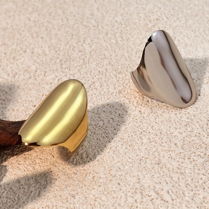 Minimalist wide geometric open ring in gold and silver with fluid metal texture