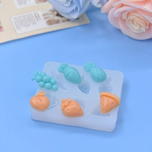 Silicone fruit mold for DIY resin cakes featuring strawberry pineapple and watermelon shapes