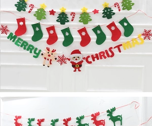 Detail of felt Christmas banners with Merry Christmas letters and festive holiday shapes