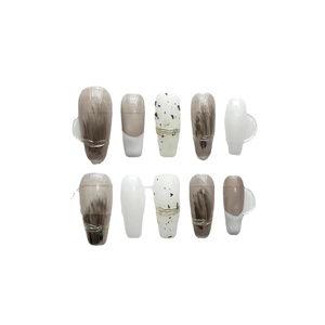 Handmade ballerina press-on nails with brown marble, terrazzo patterns and gold wire accents