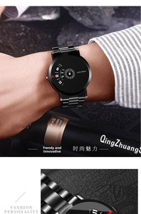 Detail view of the sleek black stainless steel rotating dial watch on a model wrist