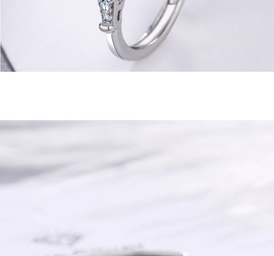 Close-up of S925 sterling silver ring featuring clear cubic zirconia and S925 hallmark