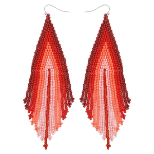 Handmade bohemian beaded tassel earrings featuring a vibrant red gradient and silver hooks