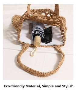 Detail showing the inner capacity of straw bag with an umbrella and sunglasses