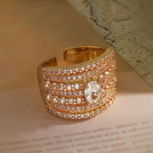 Gold plated geometric open ring with micro-pave crystals and large oval centerpiece