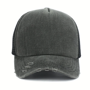 Detail of washed charcoal baseball cap featuring distressed holes and breathable black mesh