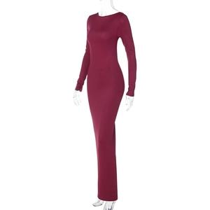 Detail of burgundy backless slim fit maxi dress featuring pleated details and elastic fabric