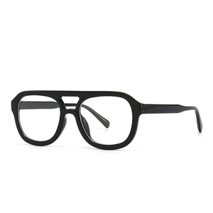 Modern retro square flat top sunglasses with thick black frames and clear lenses