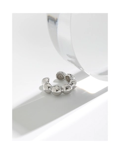 Detailed close-up of S925 sterling silver geometric bead clip earrings on a white surface