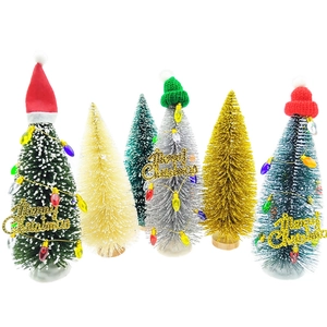 Mini sisal Christmas trees with Santa hats and gold Merry Christmas signs