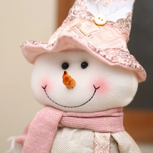 Pink Christmas snowman doll with sequined hat and scarf for festive home decor