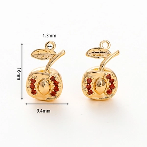 Macro view of 18k gold plated apple pendant with red zircon stones and detailed dimensions