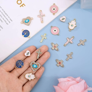 Detailed set of evil eye pendants with hamsa hand and cross for DIY jewelry making