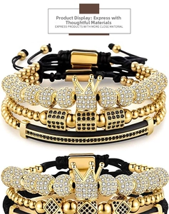 Macro detail of men's crown bead bracelets set with white cubic zirconia in gold plating