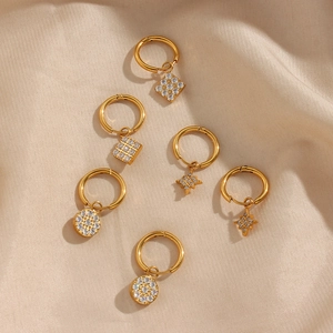 Three pairs of 18K gold-plated stainless steel hoop earrings with star and round charms