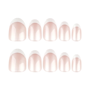 Classic white French tip press-on nails with a pearlescent nude pink base in short round shape
