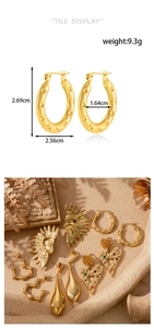 Detail of bohemian gold sun and heart earrings with precise measurements and texture