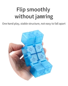 Close-up of blue translucent infinity cube with smooth flip hinges for stress relief