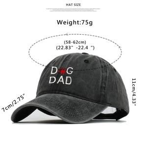 Detail of DOG DAD embroidery on washed dark grey baseball cap with size and weight info