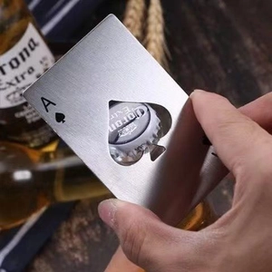 Manual usage of stainless steel Ace of Spades card bottle opener on beer bottle