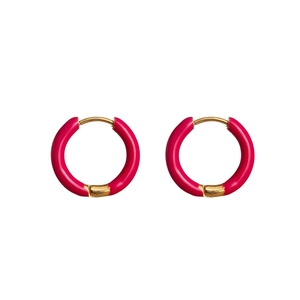 Detail of rose pink enamel coating on 18K gold plated stainless steel huggie earrings