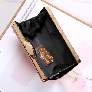 Elegant acrylic evening clutch bag with gold metal frame and detachable chain strap