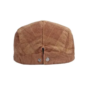 British style corduroy flat cap in tan plaid pattern featuring a metal back adjustment buckle