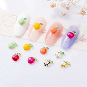 Colorful peach-shaped alloy nail art charms with enamel finish and leaf details